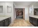 Bathroom featuring dual vanities, closet and neutral tones at 7829 Nile Cir, Arvada, CO 80007