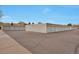 Row of multiple garages with clean asphalt in a well-maintained community setting at 9340 E Center Ave # 8A, Denver, CO 80247