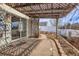 Backyard patio with a wood pergola and brick pavers at 20764 E 47Th Ave, Denver, CO 80249