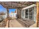 Backyard patio with a wooden pergola at 20764 E 47Th Ave, Denver, CO 80249