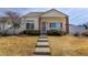 Charming single-Gathering home featuring a welcoming front porch, well-maintained landscaping, and a cozy curb appeal at 20764 E 47Th Ave, Denver, CO 80249