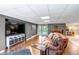 Finished basement featuring a living room with a flatscreen television at 3254 Red Tree Pl, Castle Rock, CO 80104
