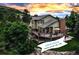 Inviting two-story home boasting an expansive deck overlooking a lush, landscaped yard, perfect for outdoor living at 3254 Red Tree Pl, Castle Rock, CO 80104