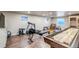 Finished basement area with gym equipment and recreational games for a complete workout space at 3254 Red Tree Pl, Castle Rock, CO 80104