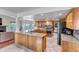 Spacious kitchen with stainless steel appliances, lots of cabinets, and an island sink at 3254 Red Tree Pl, Castle Rock, CO 80104
