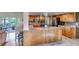 Gourmet kitchen featuring granite countertops, stainless steel appliances, and an island with seating at 3254 Red Tree Pl, Castle Rock, CO 80104