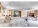 Large and open main bedroom with en suite bath, views, neutral colors, and lots of space at 3254 Red Tree Pl, Castle Rock, CO 80104