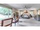 Spacious main bedroom featuring plush carpet, ceiling fan, and bright windows at 3254 Red Tree Pl, Castle Rock, CO 80104