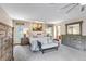 This main bedroom features a king bed, calming color palette, and lots of closet and dresser space at 3254 Red Tree Pl, Castle Rock, CO 80104