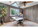 A well-lit office space with modern desk, large windows offering natural light, and a relaxing atmosphere at 3254 Red Tree Pl, Castle Rock, CO 80104