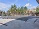 Outdoor community pool is covered by a solid mesh cover for safety and protection at 9019 E Panorama Cir # D217, Englewood, CO 80112