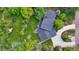 Aerial view of a landscaped property showing the home, driveway, and expansive yard at 5752 S Jasmine St, Greenwood Village, CO 80111