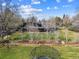 Aerial view of the house with large backyard, garden bed, and trampoline at 5752 S Jasmine St, Greenwood Village, CO 80111