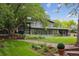 Stunning exterior view of a home showcasing landscaped grounds and outdoor living space at 5752 S Jasmine St, Greenwood Village, CO 80111