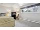Bedroom with a neutral palette, a desk, and a large window at 5752 S Jasmine St, Greenwood Village, CO 80111