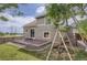 Large backyard with a patio, swing set, grassy area, and fencing, ideal for outdoor activities and Gathering fun at 19688 E Lasalle Dr, Aurora, CO 80013