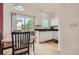 Bright dining area featuring a sliding glass door for outdoor access and ample natural light at 19688 E Lasalle Dr, Aurora, CO 80013