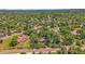 Overhead shot of a serene neighborhood, adorned with mature trees and charming homes at 1 Lindenwood Dr, Littleton, CO 80120