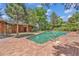 Sparkling pool with brick surround and lush landscaping at 1 Lindenwood Dr, Littleton, CO 80120
