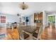 Inviting living area with a fireplace and dining area at 8029 E 23Rd Ave, Denver, CO 80238