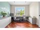 Home office with built-in storage, desk, and natural light at 8029 E 23Rd Ave, Denver, CO 80238