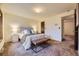 Spacious bedroom with a comfortable bed and plenty of room at 7419 S Birch St, Centennial, CO 80122