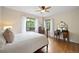Bright bedroom with natural light from two windows and hardwood floors at 1930 E 8Th Ave, Denver, CO 80206