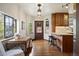 Bright breakfast nook with windows, table seating and built in kitchen bar top at 1930 E 8Th Ave, Denver, CO 80206