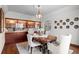 Formal dining room featuring custom cabinets, a decorative chandelier, and plush, comfortable seating at 1930 E 8Th Ave, Denver, CO 80206