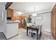 Charming dining area adjacent to kitchen, perfect for gatherings at 203 Wright St # 102, Lakewood, CO 80228