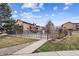 View of the condo community showcasing green spaces and community amenities at 203 Wright St # 102, Lakewood, CO 80228