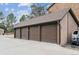 Detached garages with ample parking space and numbered bays for residents at 203 Wright St # 102, Lakewood, CO 80228