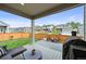 Cozy back patio features an outdoor seating area, perfect for relaxing and entertaining at 17765 Faraday St, Broomfield, CO 80023