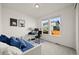 Comfortable bedroom with desk setup, natural light, and contemporary decor at 17765 Faraday St, Broomfield, CO 80023