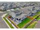 Aerial view of home featuring solar panels, backyard patio, fenced yard and outdoor dining at 17765 Faraday St, Broomfield, CO 80023
