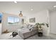 Stylish living room with a large window, comfortable couch, and unique decor creating a cozy atmosphere at 17765 Faraday St, Broomfield, CO 80023