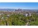 Expansive aerial view showing the cityscape and surrounding green spaces at 1260 York St # 204, Denver, CO 80206