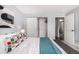 Comfortable bedroom with closet and view to hallway that gives access to other areas at 1260 York St # 204, Denver, CO 80206