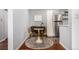 Cozy dining area featuring a round table with modern chairs and stylish sideboard at 1260 York St # 204, Denver, CO 80206