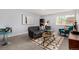 Stylish living room with contemporary furniture and plenty of light at 1260 York St # 204, Denver, CO 80206