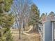 View of the community with well-maintained buildings and landscaped walkways at 8335 Fairmount Dr # 11-203, Denver, CO 80247