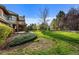 Spacious backyard with lush lawn and mature trees at 4282 Preserve N Pkwy, Greenwood Village, CO 80121