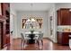 Charming breakfast nook with a round table and chairs, near the kitchen at 4282 Preserve N Pkwy, Greenwood Village, CO 80121