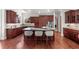 Gourmet kitchen featuring granite countertops and custom cabinetry at 4282 Preserve N Pkwy, Greenwood Village, CO 80121