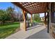 Covered patio with pergola offering shade and outdoor dining space at 4282 Preserve N Pkwy, Greenwood Village, CO 80121