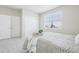 Bedroom with closet and window at 8977 Crossington Way, Lone Tree, CO 80124