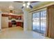 Bright dining area with sliding glass doors leading to the backyard adjacent to the kitchen at 315 E 112Th Dr, Northglenn, CO 80233