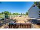 Backyard with a sand-based putting green and other recreational games at 6460 E 165Th Ct, Brighton, CO 80602