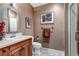 Clean basement bathroom with updated vanity and tile at 6460 E 165Th Ct, Brighton, CO 80602