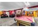 Spacious basement rec room with pool table and bar at 6460 E 165Th Ct, Brighton, CO 80602